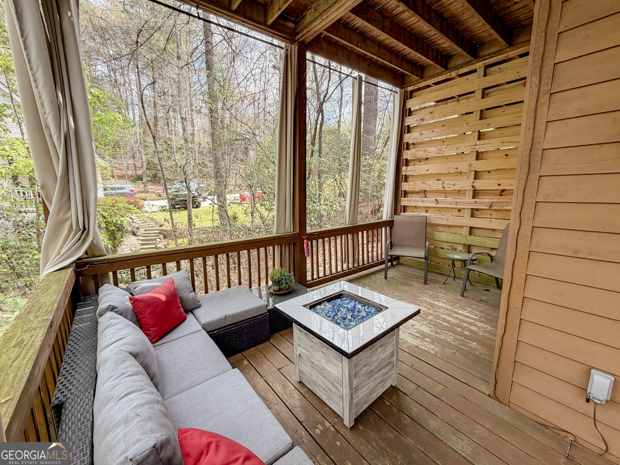 703 Zeppelin Strasse Helen, GA 30545 - Photo 26 of 28 a living room with furniture and a gate