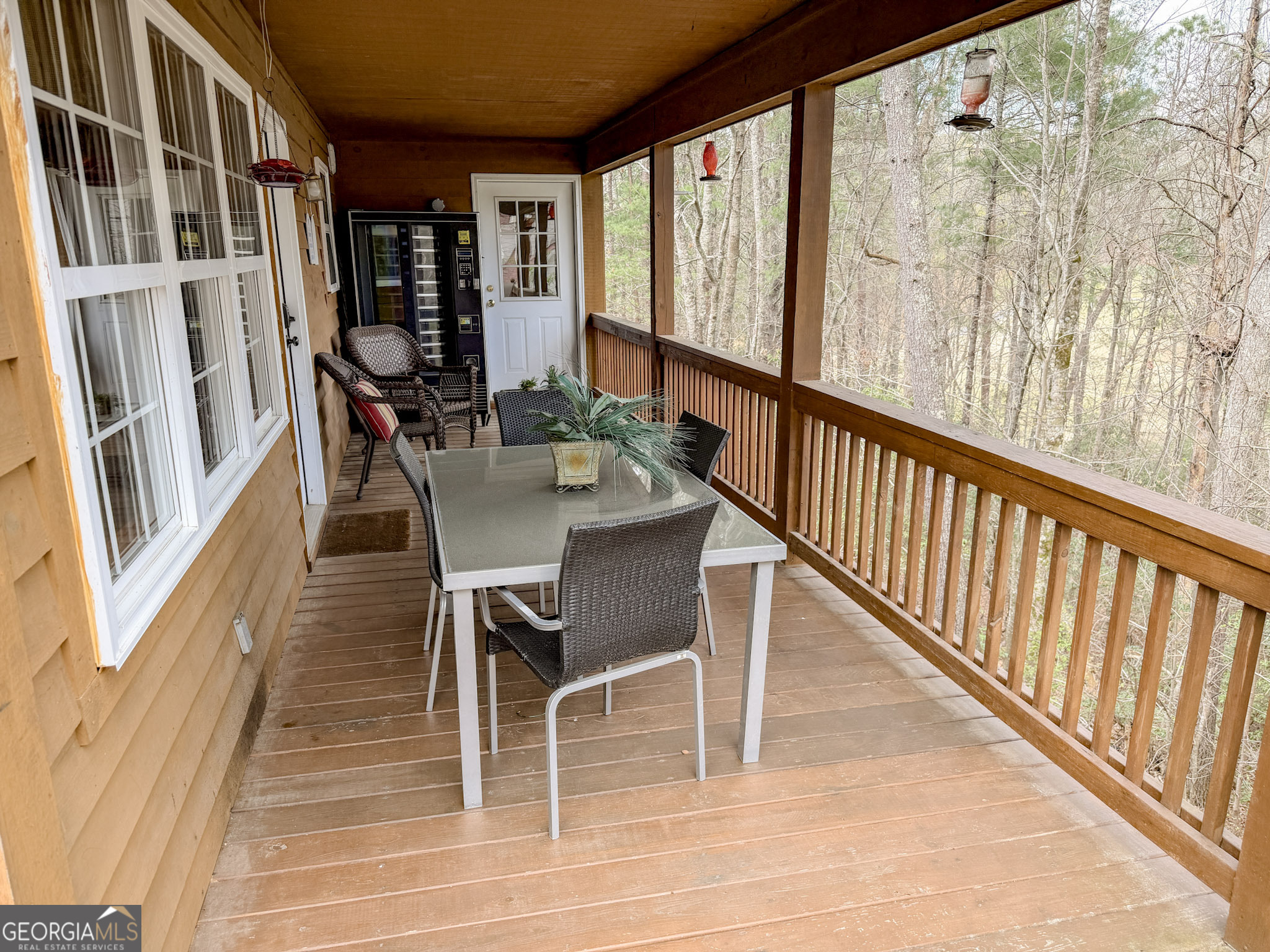 703 Zeppelin Strasse Helen, GA 30545 - Photo 4 of 28 a view of a dining room with furniture window and wooden floor