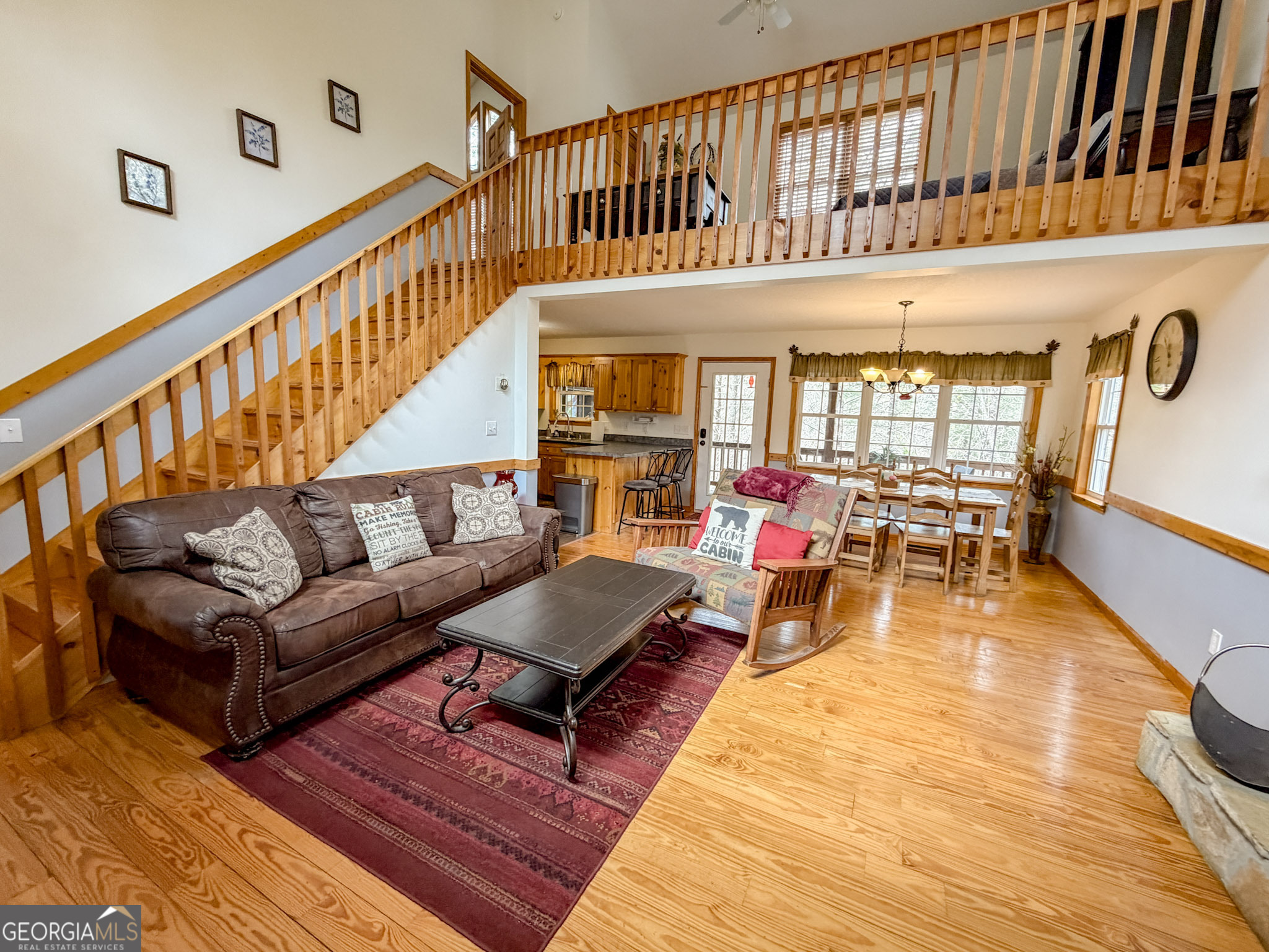 703 Zeppelin Strasse Helen, GA 30545 - Photo 7 of 28 a living room with furniture oven and a rug