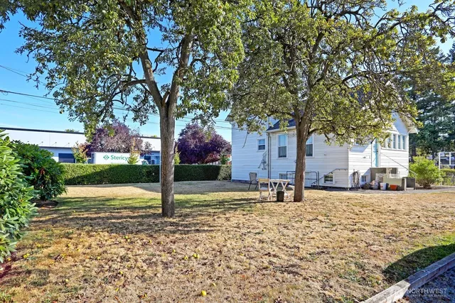 a house with trees in front of it