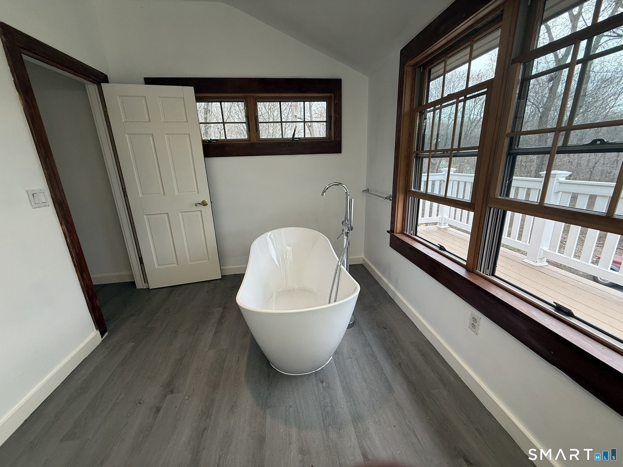 110 Town Woods Road Lyme, CT 06371 - Photo 18 of 37 a spacious bathroom with a bathtub and a window