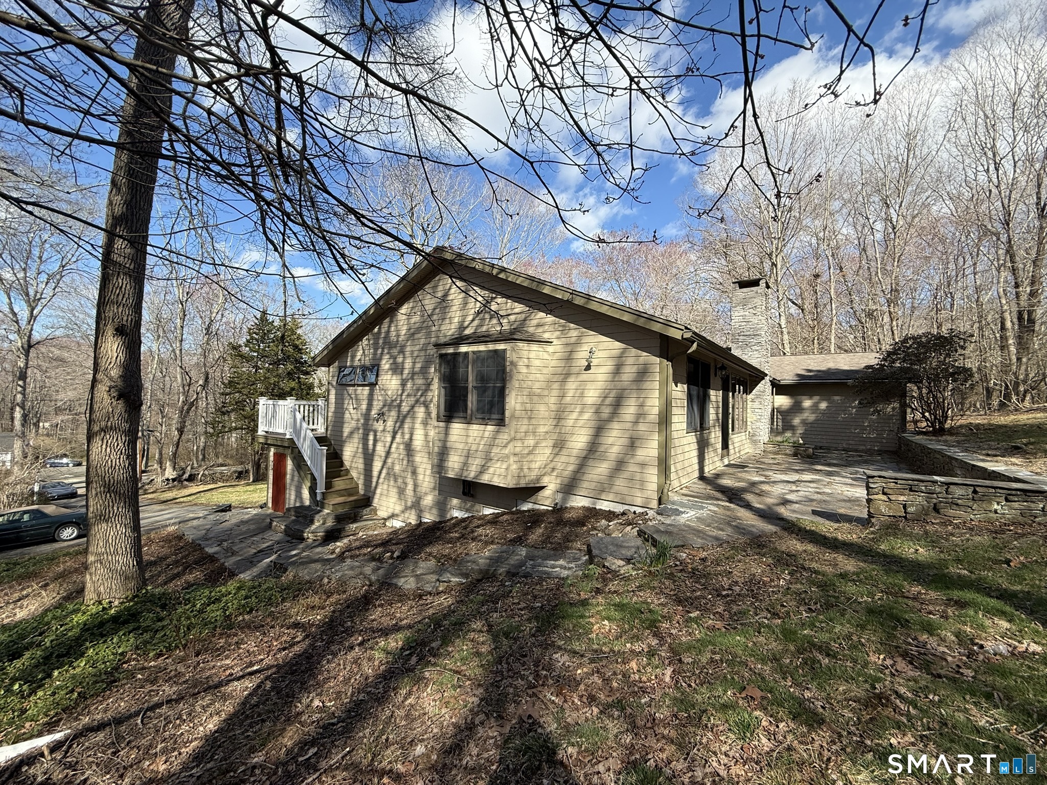 110 Town Woods Road Lyme, CT 06371 - Photo 2 of 37 a view of a house with a yard