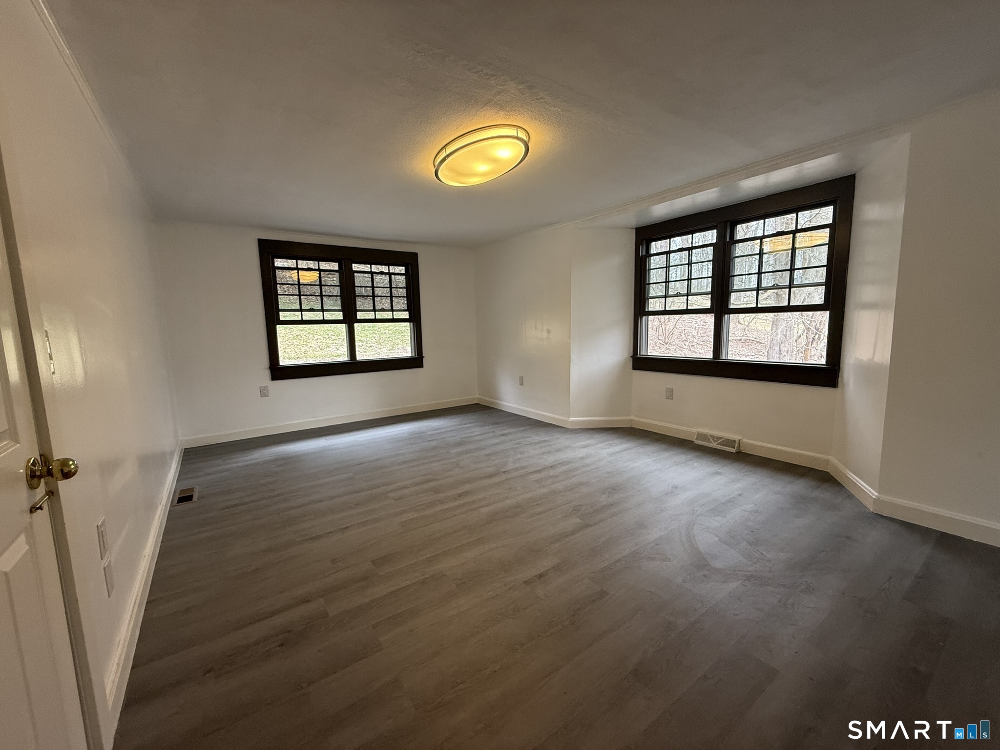 110 Town Woods Road Lyme, CT 06371 - Photo 21 of 37 an empty room with windows