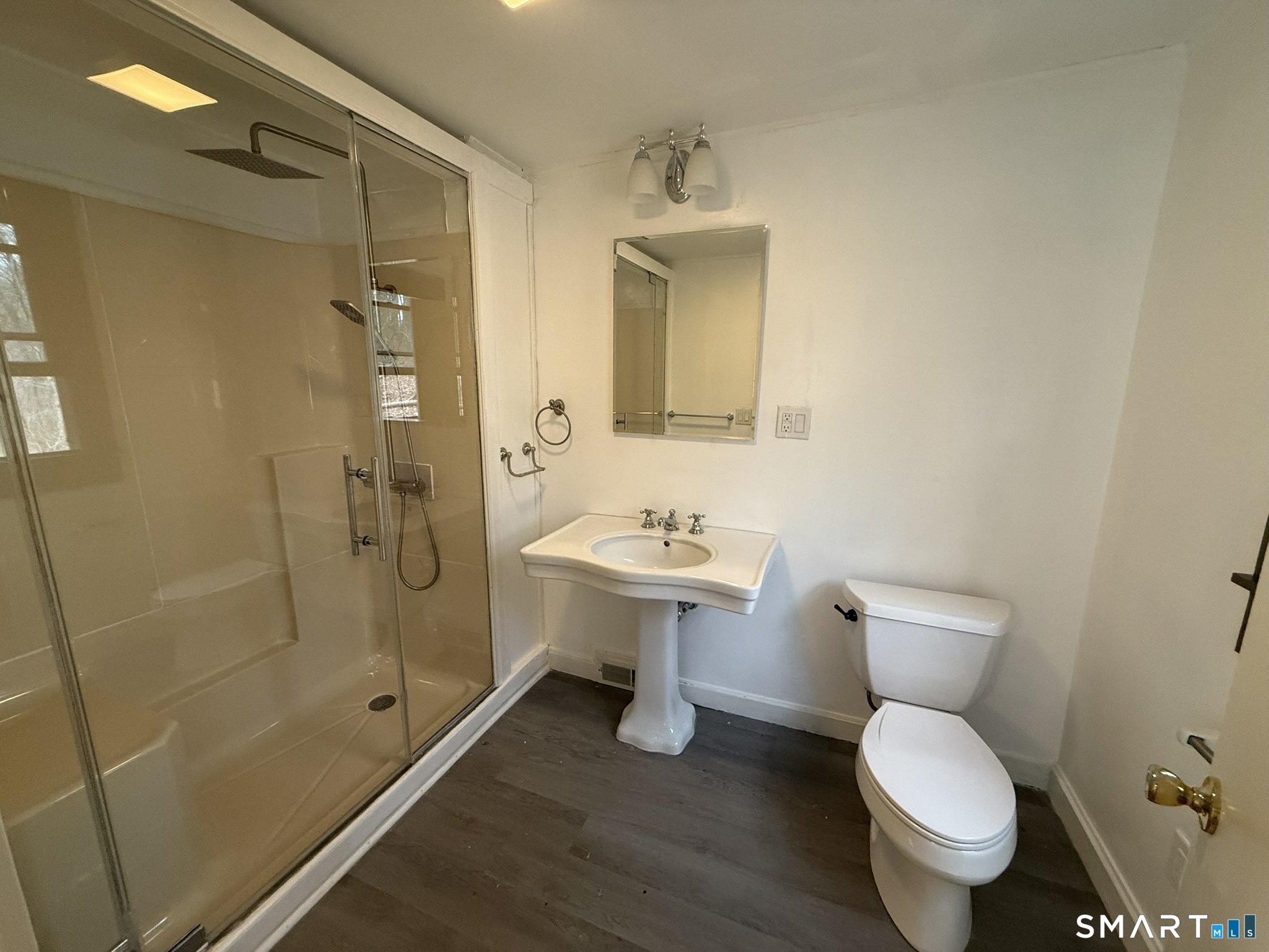 110 Town Woods Road Lyme, CT 06371 - Photo 24 of 37 a bathroom with a toilet sink and shower