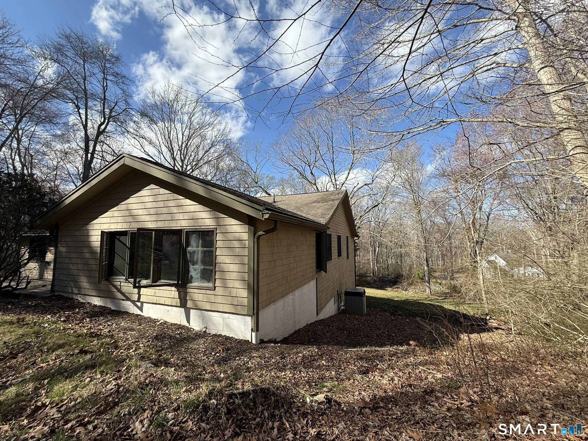 110 Town Woods Road Lyme, CT 06371 - Photo 7 of 37 a view of a house with a yard