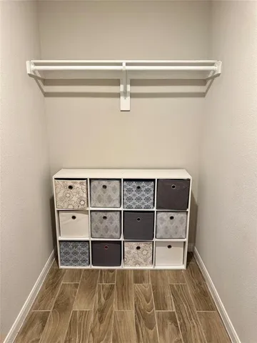 a view of an empty walk in closet