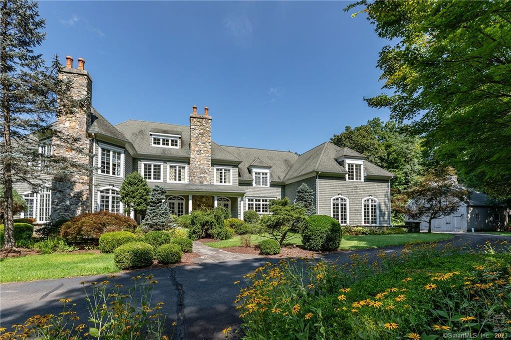 55 Chestnut Tree Hill Road Southbury, CT 06488 - Photo 1 of 1 a front view of a house with a yard