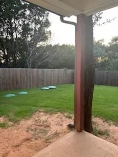 a view of backyard with green space