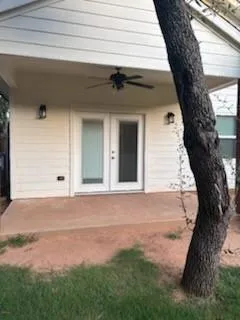 a view of backyard of a house