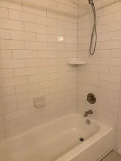 a bathroom with a bathtub