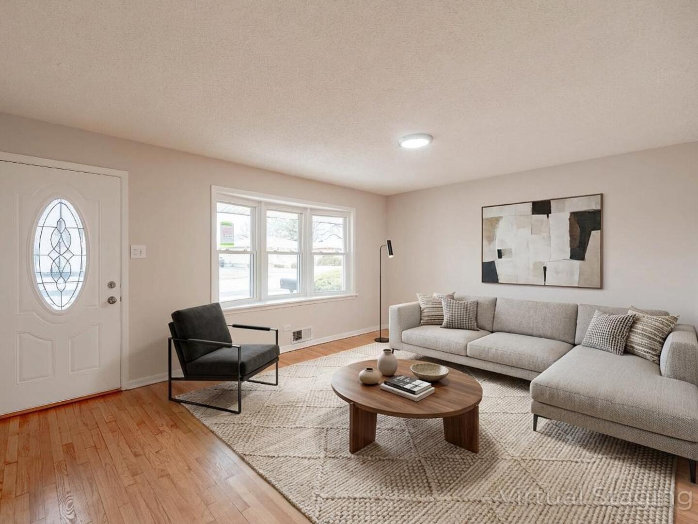 18331 Hickory Street Lansing, IL 60438 - Photo 2 of 12 a living room with furniture and a window