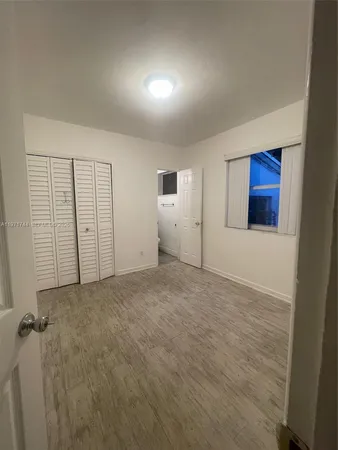 a bathroom with a toilet and a sink