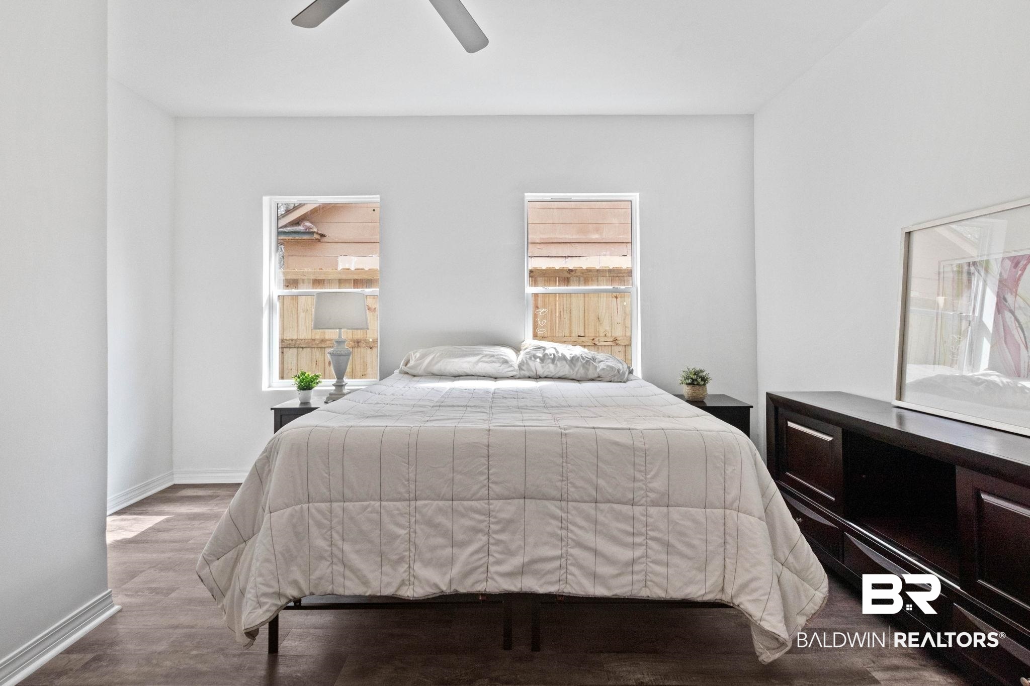 128 Bush Avenue Mobile, AL 36604 - Photo 19 of 40 Bedroom featuring dark wood finished floors and ceiling fan