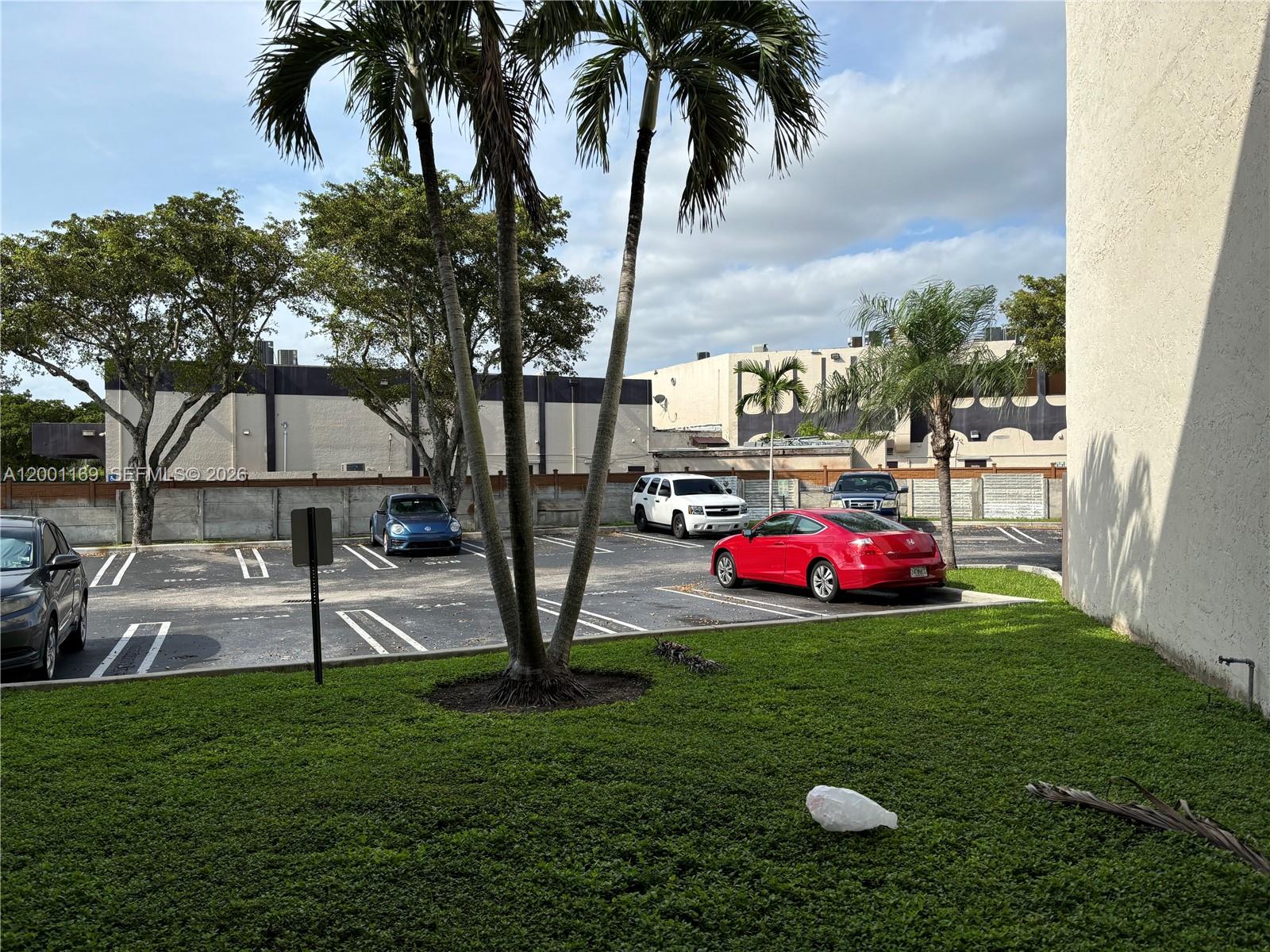 10900 Southwest 104th Street, Unit 303 Miami, FL 33176 - Photo 34 of 40 a view of a backyard with swimming pool