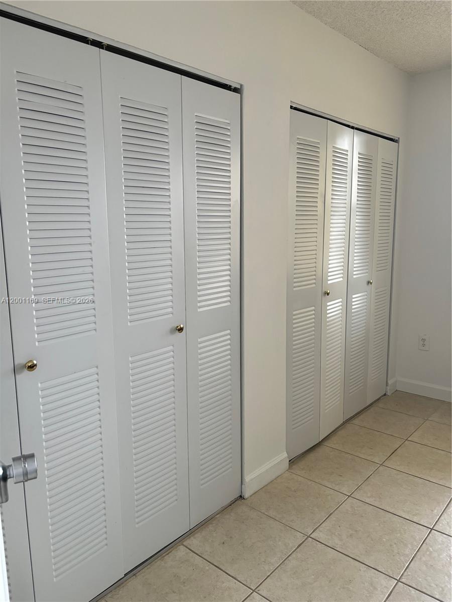 10900 Southwest 104th Street, Unit 303 Miami, FL 33176 - Photo 4 of 40 a view of a room with an empty space