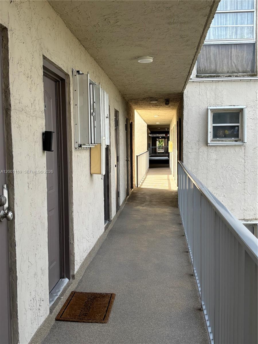 10900 Southwest 104th Street, Unit 303 Miami, FL 33176 - Photo 9 of 40 a view of hallway