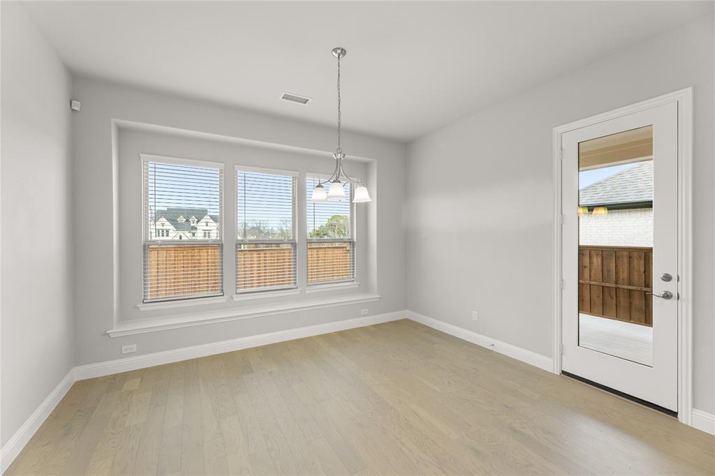 3539 Helios Lane Corinth, TX 76208 - Photo 18 of 33 a view of an empty room with a window