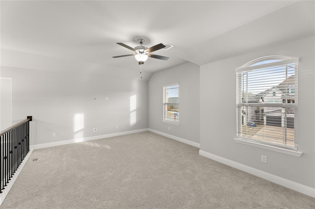 3539 Helios Lane Corinth, TX 76208 - Photo 24 of 33 wooden floor in an empty room with a window
