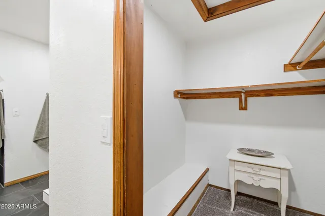 a view of a hallway with entryway