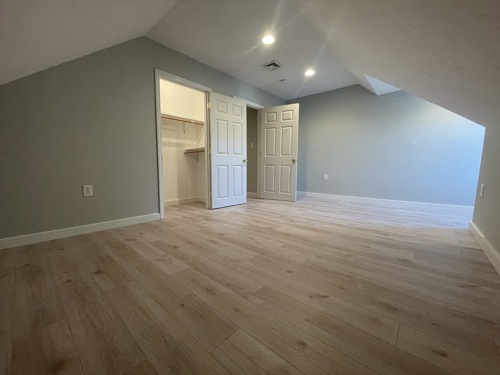 97 Cottage Street, Unit 2 Northbridge, MA 01588 - Photo 12 of 14 a view of an empty room with a window