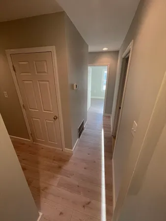 a view of hallway with stairs