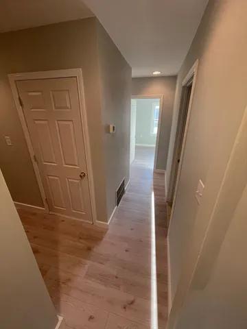 a view of hallway with stairs