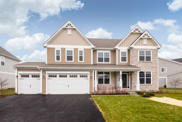 864 Heatherfield Circle Naperville, IL 60565 - Photo 1 of 1 front view of a house with a yard
