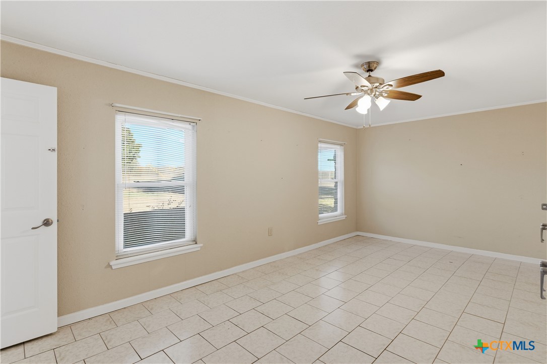 151 Hillside Street Seguin, TX 78155 - Photo 11 of 33 a view of an empty room with a window