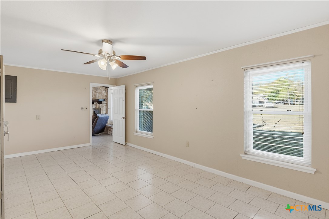 151 Hillside Street Seguin, TX 78155 - Photo 12 of 33 a view of an empty room with a window