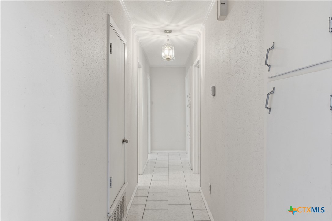 151 Hillside Street Seguin, TX 78155 - Photo 13 of 33 a view of a hallway with a shower