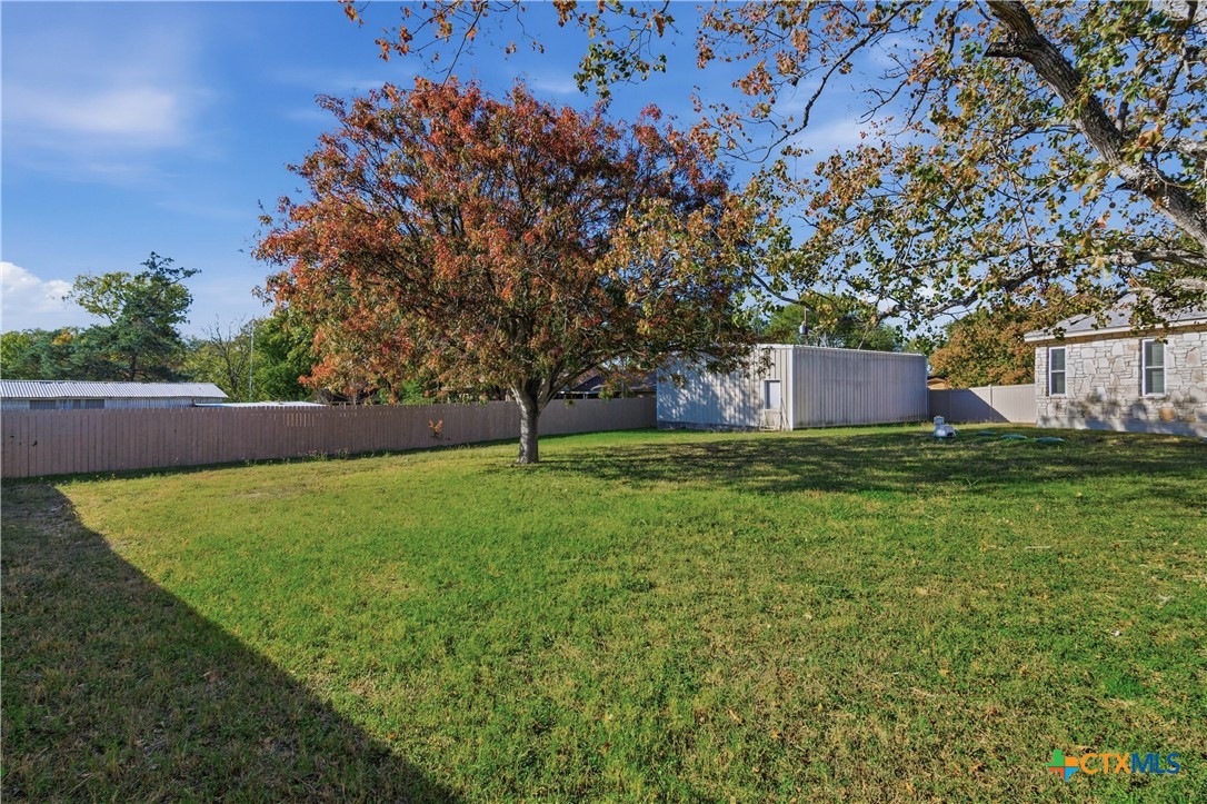 151 Hillside Street Seguin, TX 78155 - Photo 26 of 33 a view of a backyard with a garden