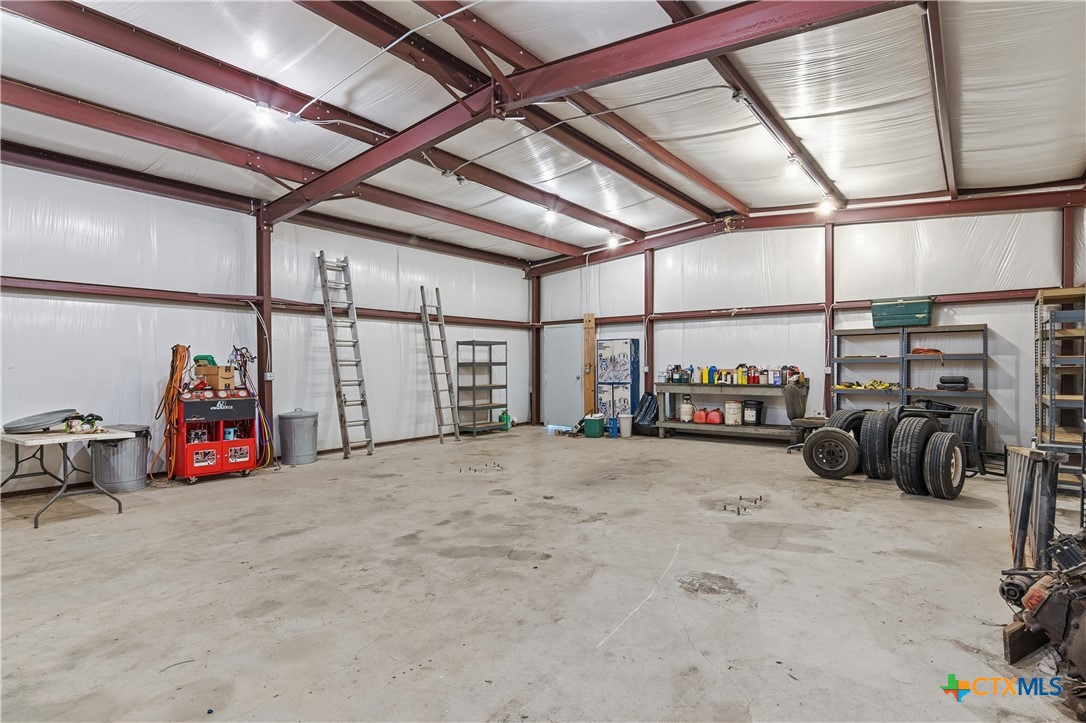 151 Hillside Street Seguin, TX 78155 - Photo 29 of 33 a view of a garage with storage