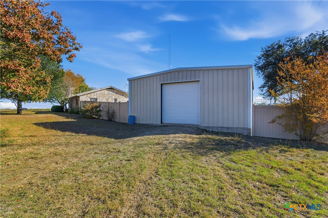 151 Hillside Street Seguin, TX 78155 - Photo 33 of 33 a view of yard with car parked in front of house