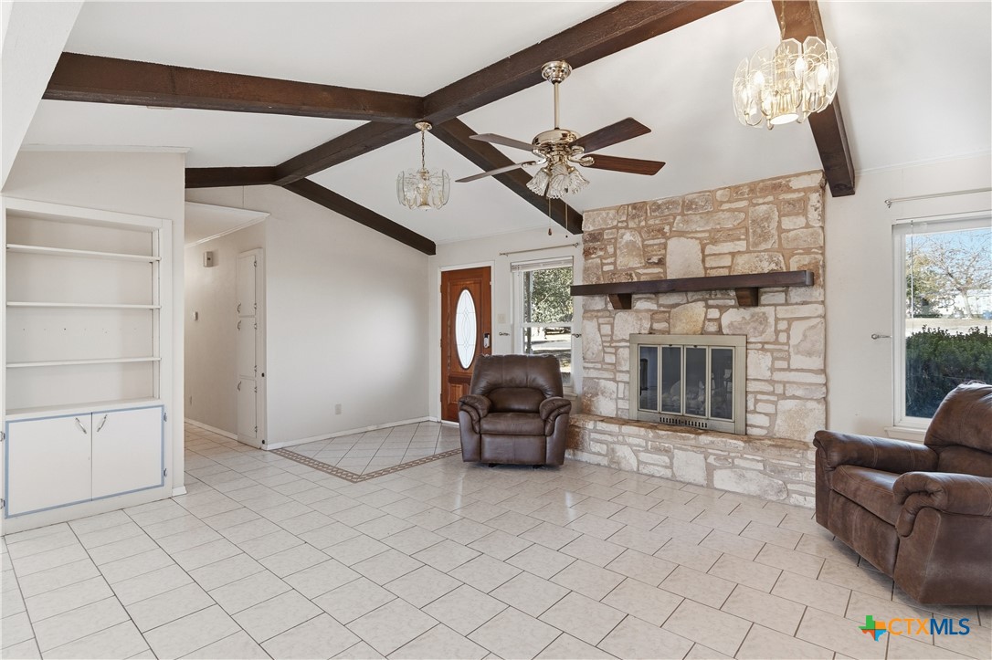 151 Hillside Street Seguin, TX 78155 - Photo 4 of 33 a living room with furniture and a fireplace