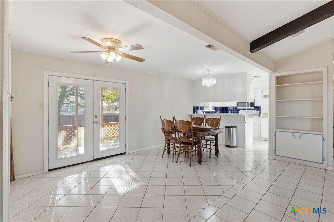 151 Hillside Street Seguin, TX 78155 - Photo 7 of 33 a view of a dining room with furniture and chandelier