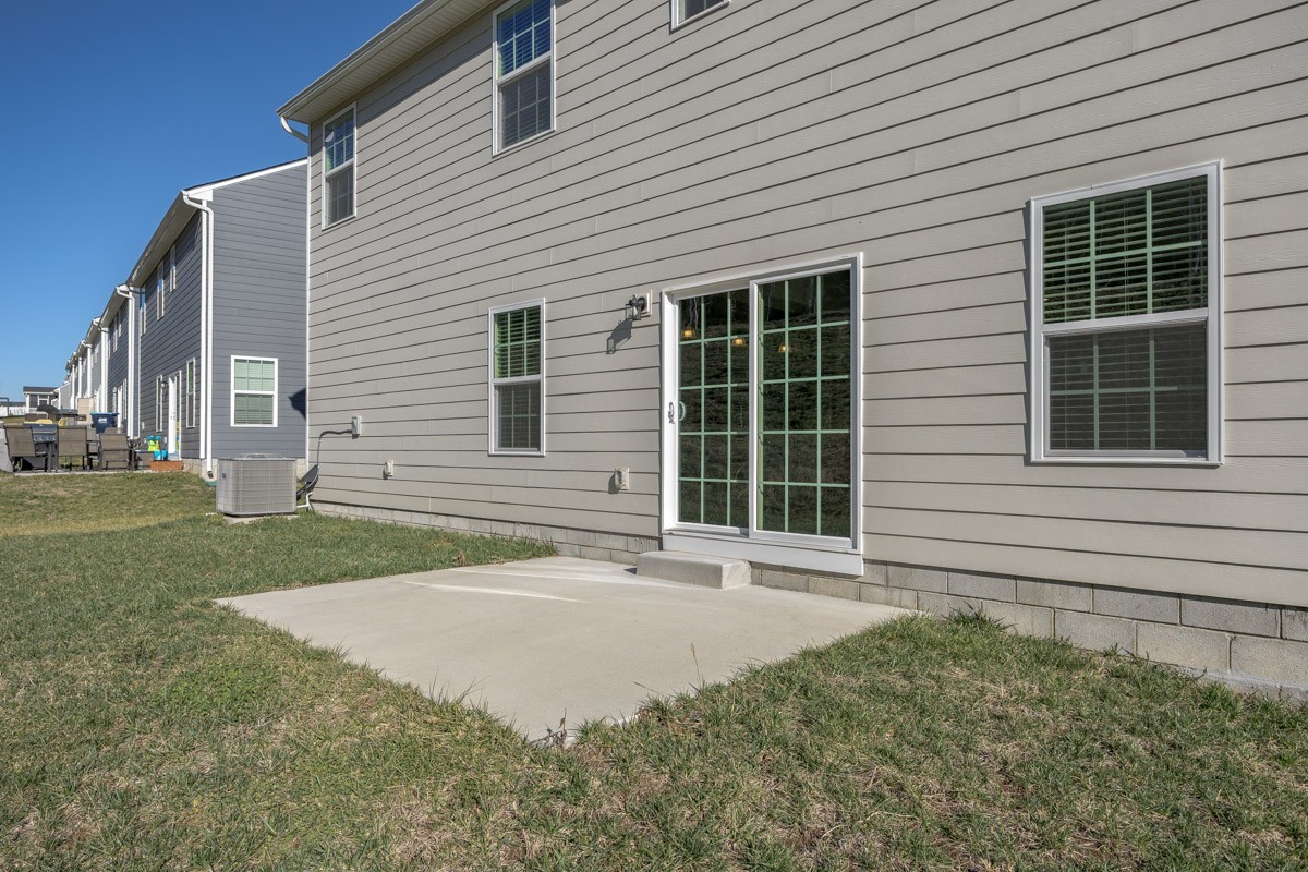 968 Caywood Road Smyrna, TN 37167 - Photo 47 of 54 a front view of a house with a yard and garage