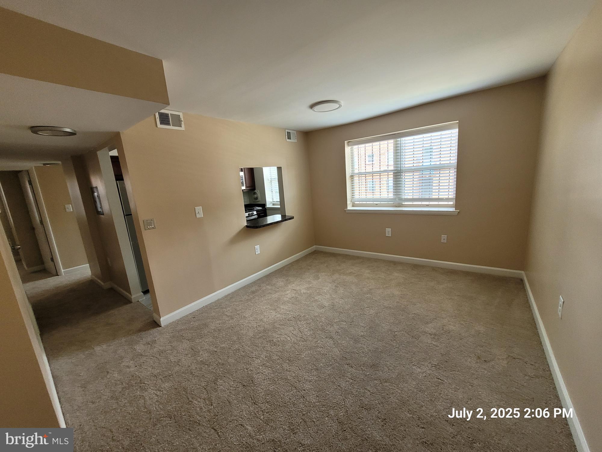 2644 Birney Place Southeast, Unit 102 Washington, DC 20020 - Photo 18 of 36 a view of an empty room with a window