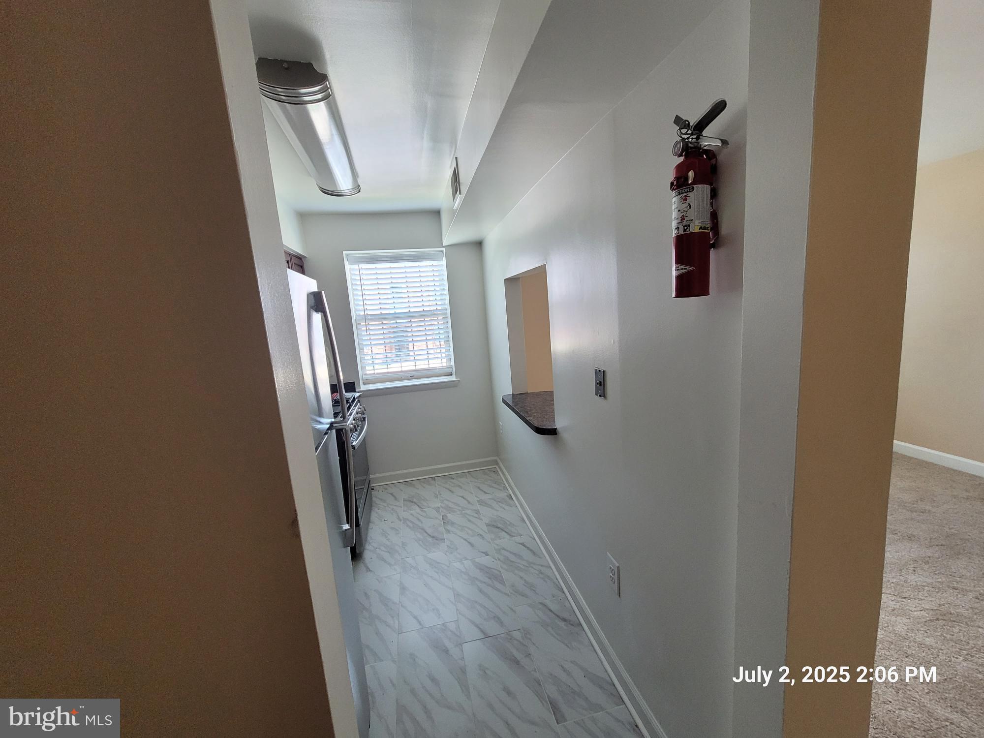 2644 Birney Place Southeast, Unit 102 Washington, DC 20020 - Photo 20 of 36 wooden floor in a gallery