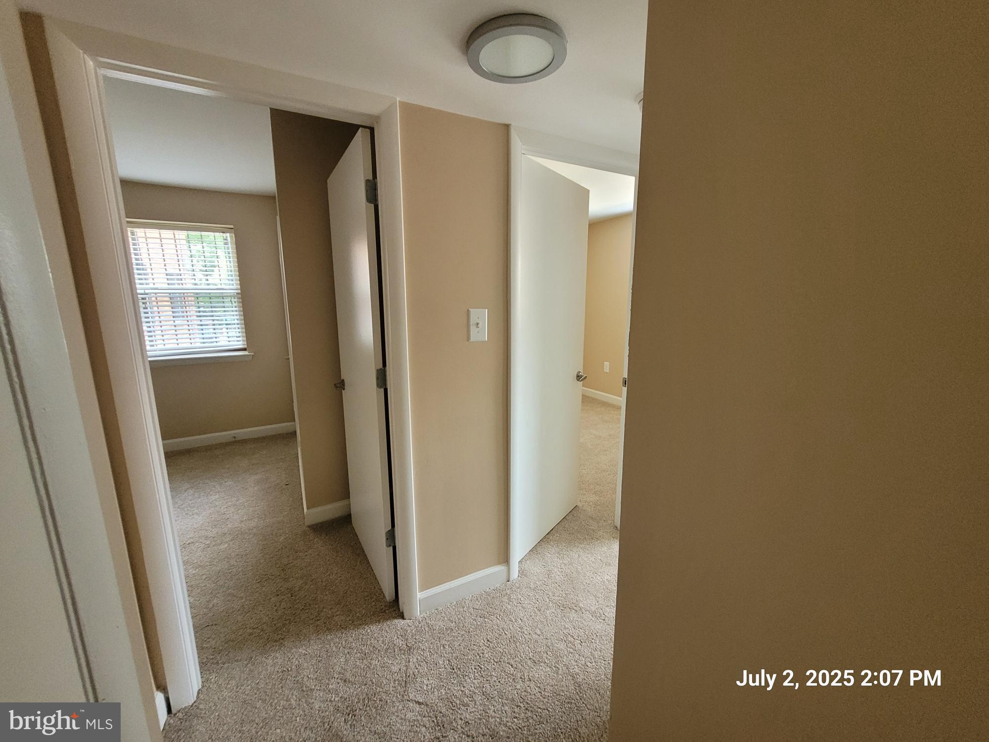 2644 Birney Place Southeast, Unit 102 Washington, DC 20020 - Photo 21 of 36 a view of a hallway with windows