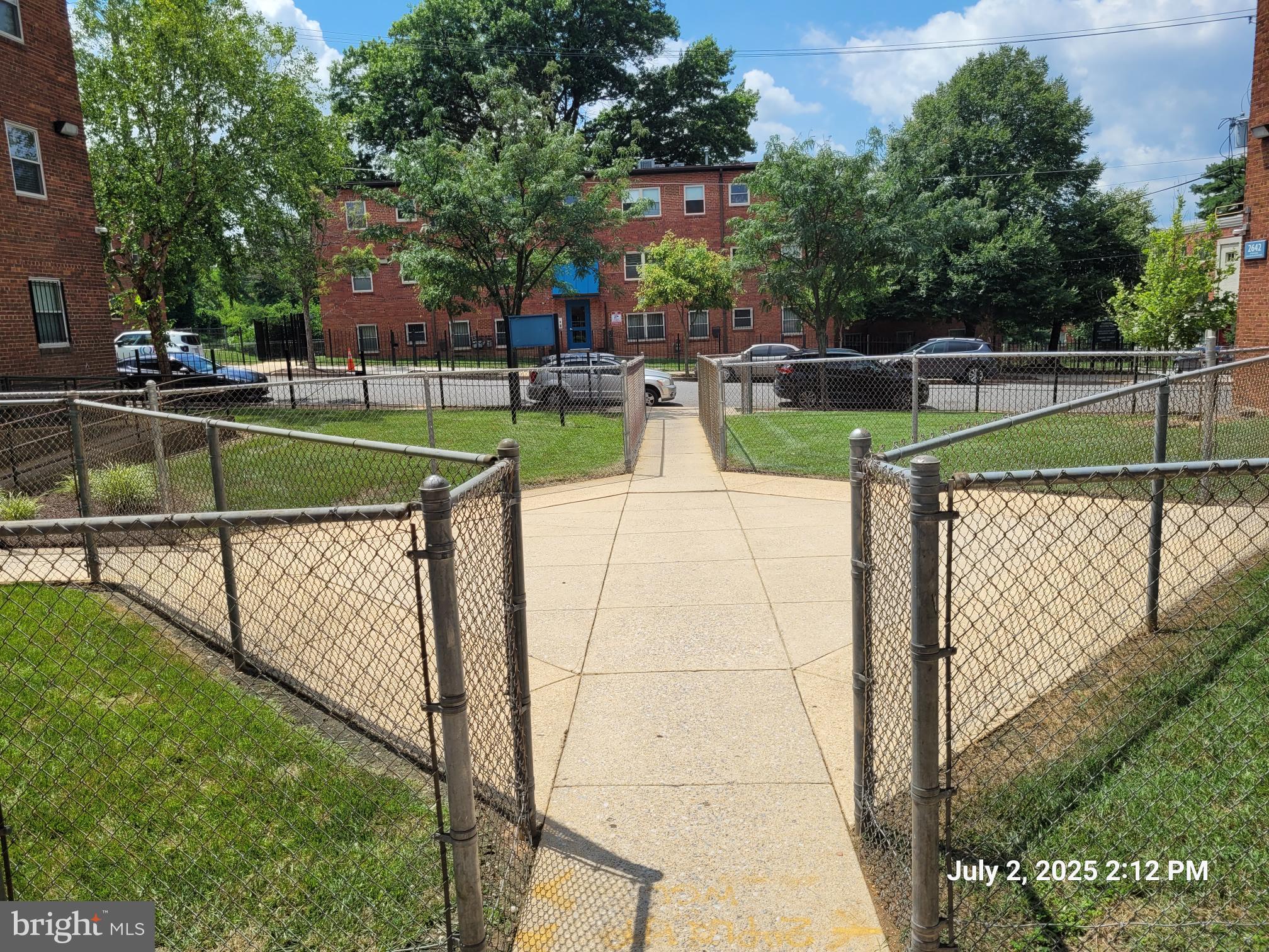 2644 Birney Place Southeast, Unit 102 Washington, DC 20020 - Photo 34 of 36 a view of a park with swings and slides