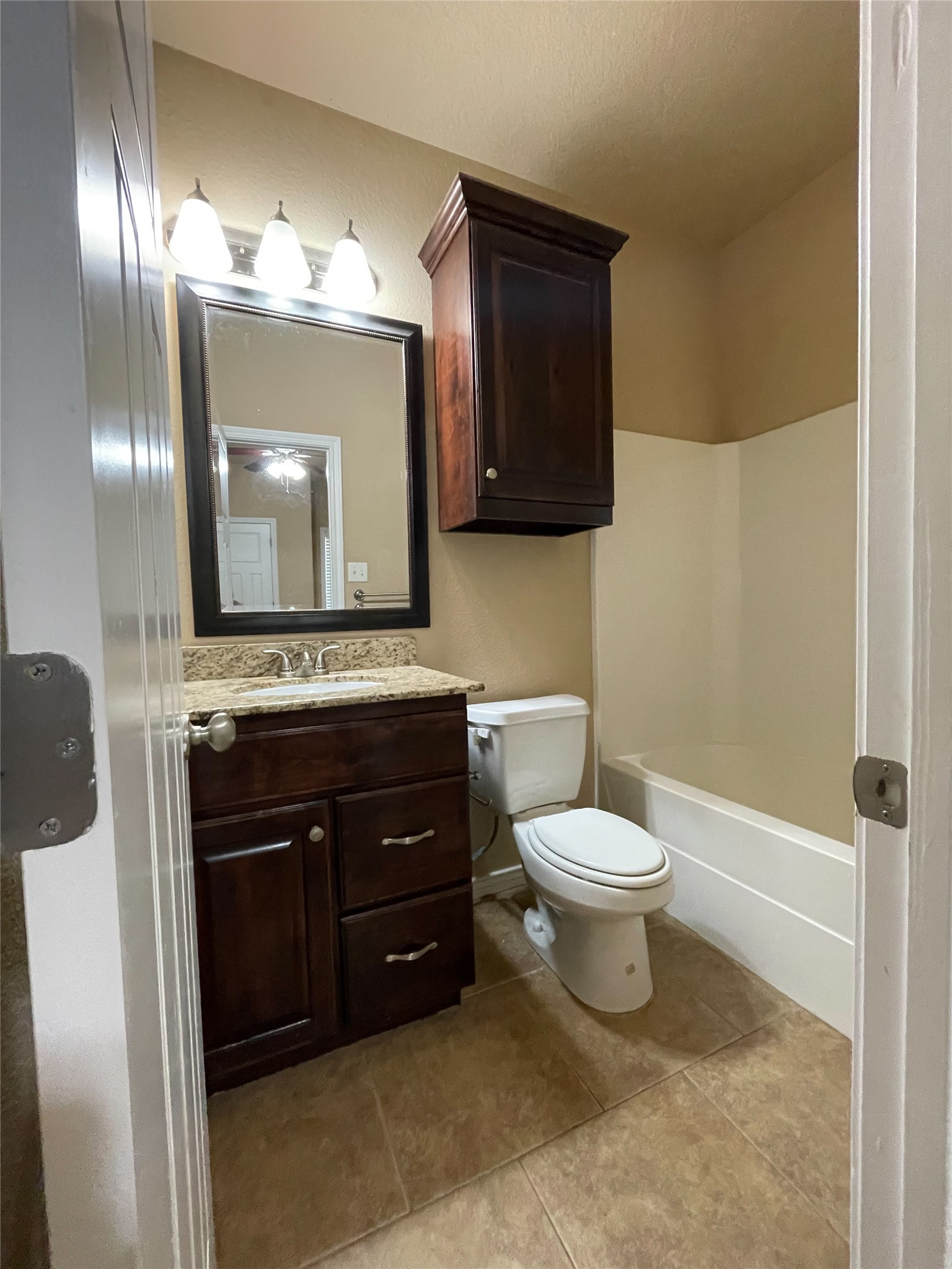 3519 Haverford Road College Station, TX 77845 - Photo 12 of 15 a bathroom with a toilet sink and mirror