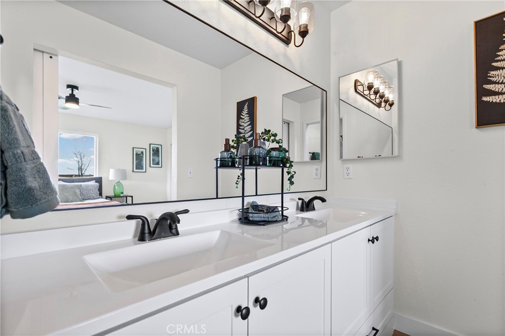 5658 Prancing Deer Road Paso Robles, CA 93446 - Photo 14 of 31 a close view of sink and mirror