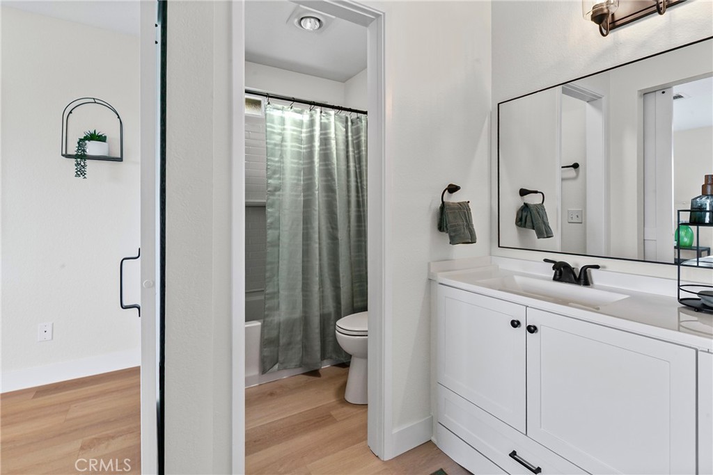 5658 Prancing Deer Road Paso Robles, CA 93446 - Photo 15 of 31 a bathroom with a toilet sink and shower