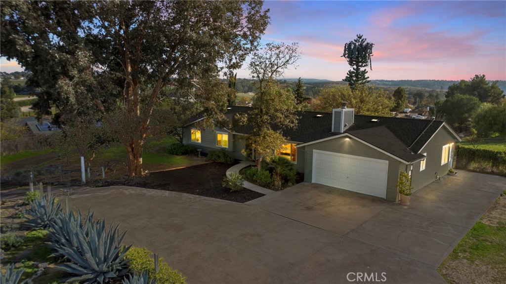 5658 Prancing Deer Road Paso Robles, CA 93446 - Photo 2 of 31 a view of a terrace with a garden