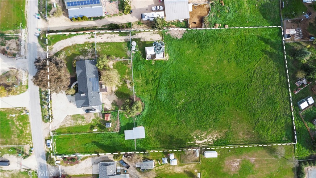 5658 Prancing Deer Road Paso Robles, CA 93446 - Photo 30 of 31 a view of a lake with a building in the background