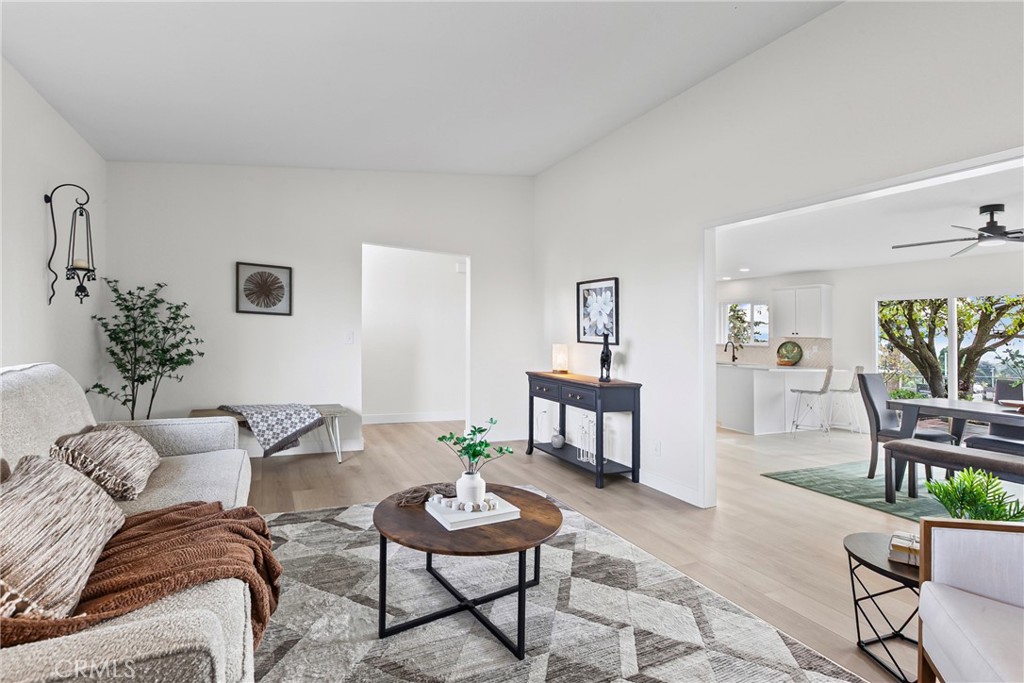 5658 Prancing Deer Road Paso Robles, CA 93446 - Photo 4 of 31 a living room with furniture and a potted plant