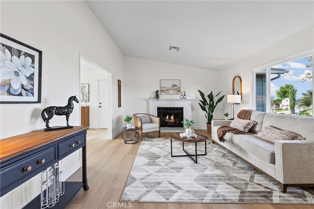 5658 Prancing Deer Road Paso Robles, CA 93446 - Photo 10 of 31 a living room with furniture and a fireplace