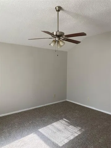a view of a small space with a fan