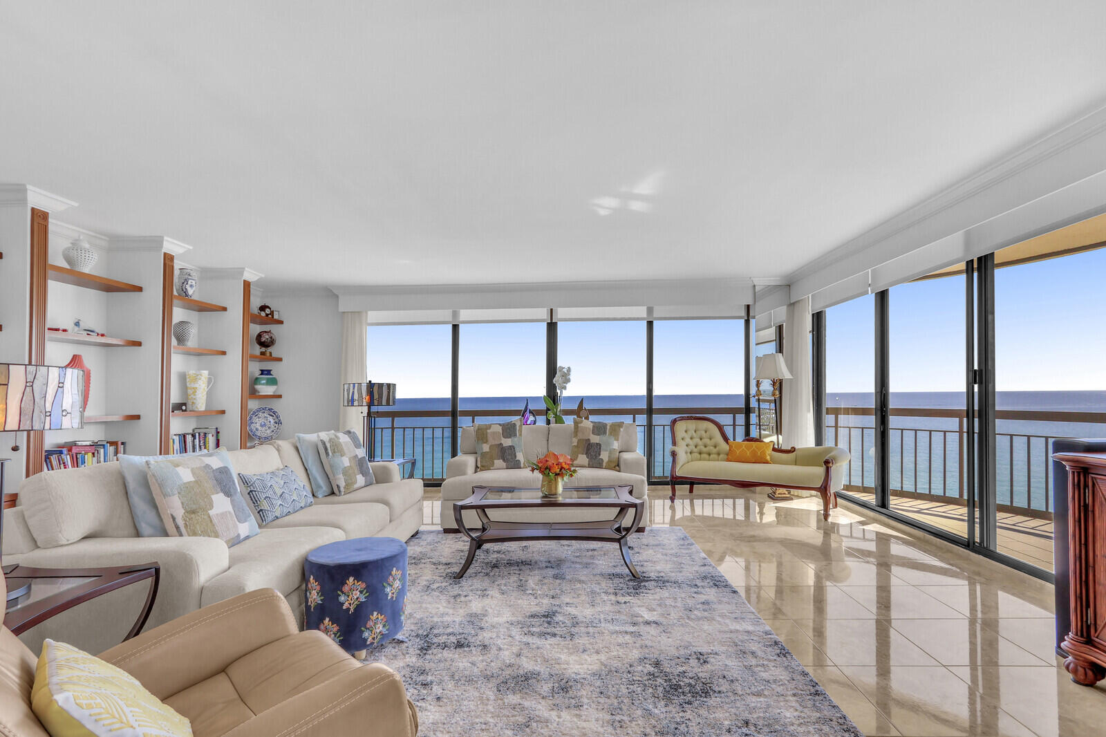 4000 North Ocean Drive, Unit 1702 Singer Island, FL 33404 - Photo 1 of 48 a living room with furniture fireplace and a large window
