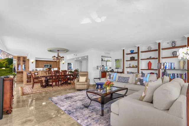 a kitchen with stainless steel appliances granite countertop a sink and a stove